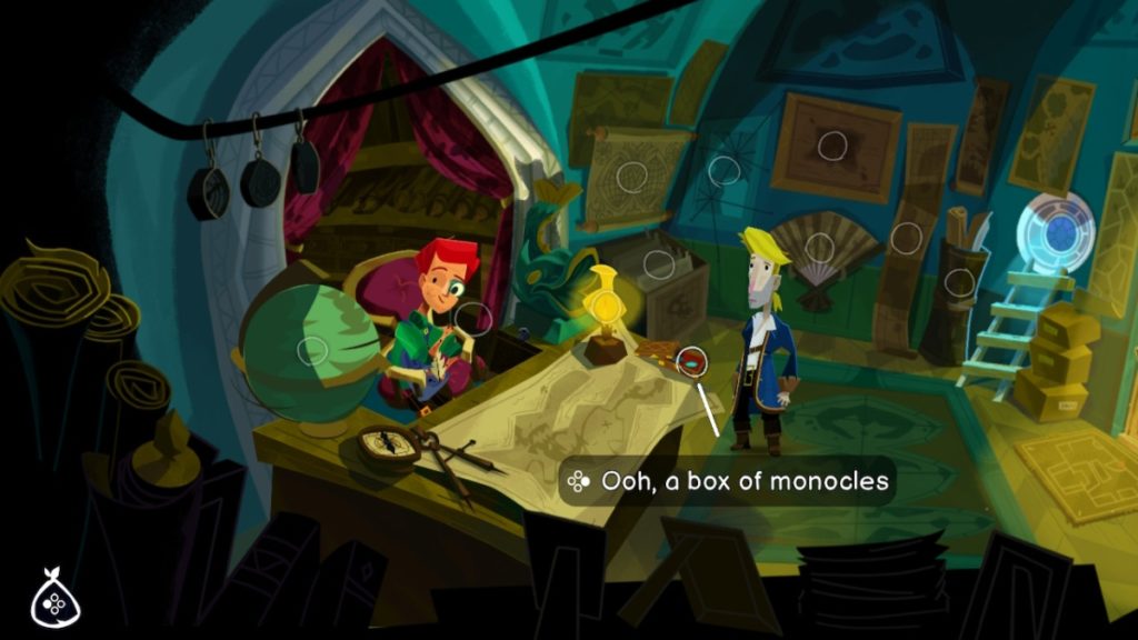 guybrush stands in the middle of a shop filled with maps. across a large map drafting table is wally, a red hair man wearing a monocle and sitting in a plush, red leather chair. text below the bin guybrush is looking at reads "ooh, a box of monocles"