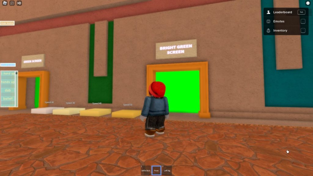 Roblox character heading to the green screen area in the game