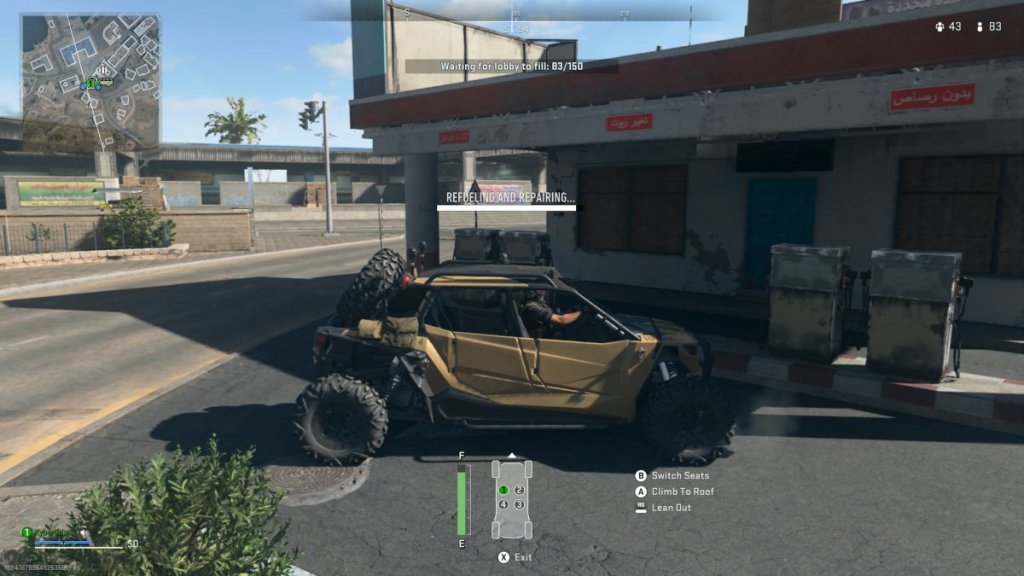 Repairing buggy at gas station