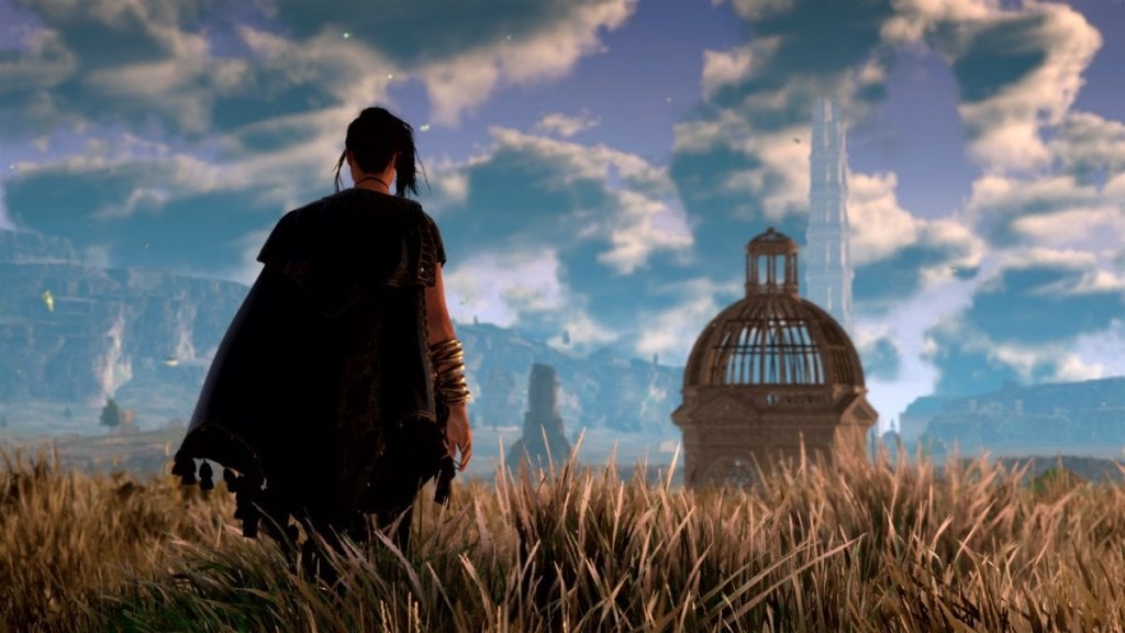 A girl in a field with a tower ahead of her