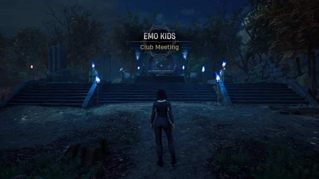 A woman in black clothes stands at the bottom of a set of dark stairs in the middle of the woods. Text in the middle reads "EMO KIDS: Club Meeting"