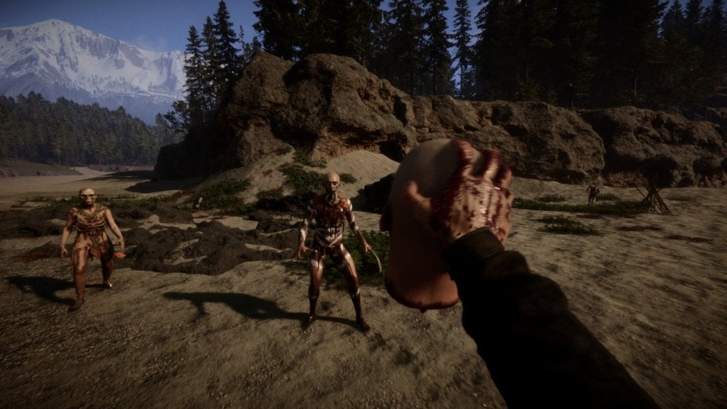 A person holding up a head to hostile enemies